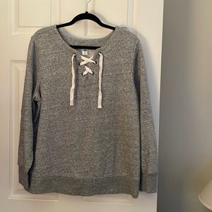Practically new grey sweatshirt with laced closure